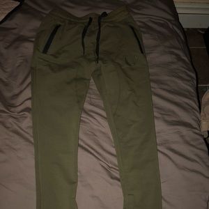 Green athletic pants